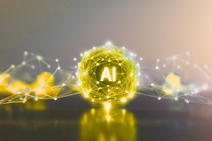 A glowing yellow sphere with the letters "AI" in the center, surrounded by a complex network of white connected dots, representing artificial intelligence.